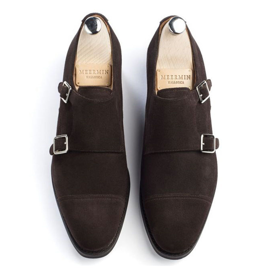Meermin brown suede double monkstrap shoes, top-down view showing cap-toe silhouette and buckle straps on shoe trees