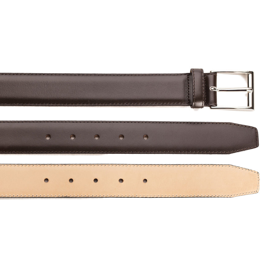 Meermin dark brown calf belt, close-up comparing buckle end, hole-punched strap, and reverse leather lining side by side