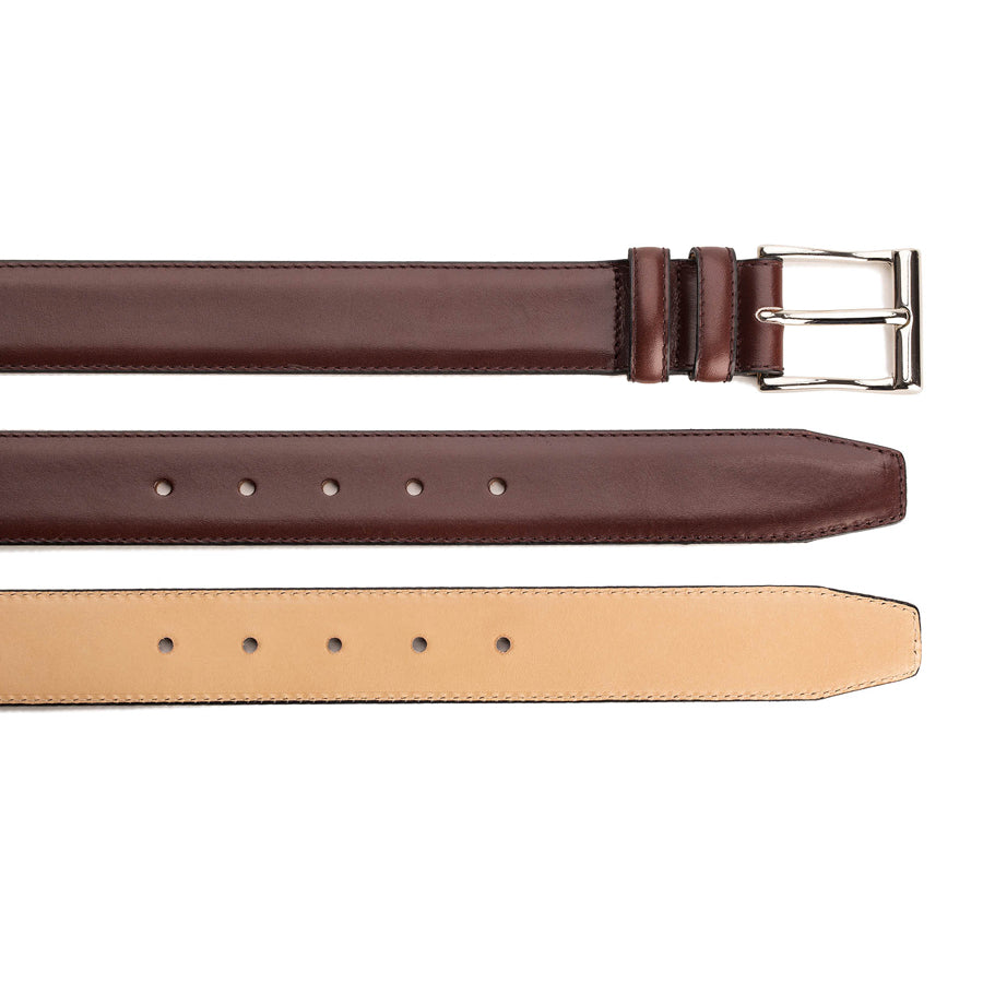 Meermin burgundy Naturcalf boxcalf belt, three views showing buckle, adjustment holes, and natural vegetable-tanned leather lining