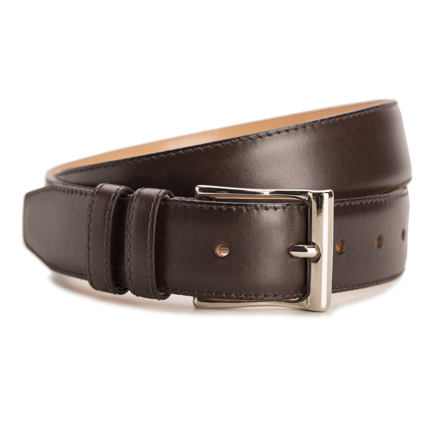 Meermin dark brown Naturcalf boxcalf belt, coiled front view showing nickel-plated buckle and double keeper loops