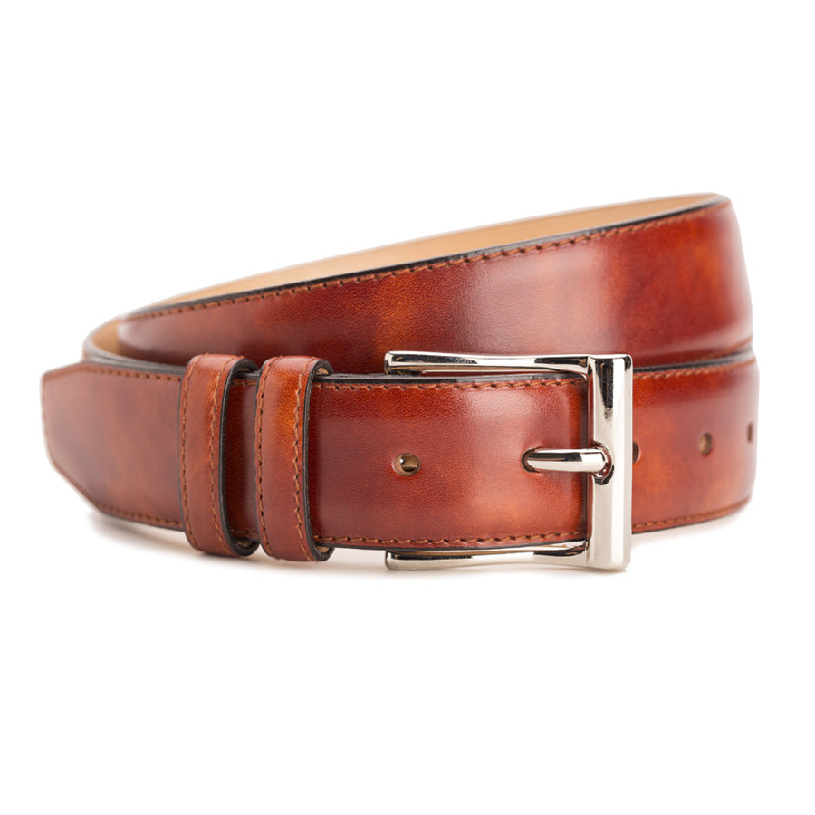 Meermin gold museum calf belt, coiled to show buckle keepers and nickel-plated solid brass buckle in close-up