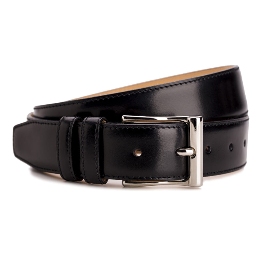 Meermin black boxcalf belt, coiled to show nickel-plated buckle and double keeper loop in close-up