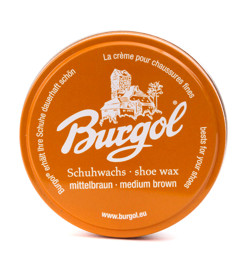 Burgol medium brown shoe wax tin, top-down view showing embossed castle logo and label text