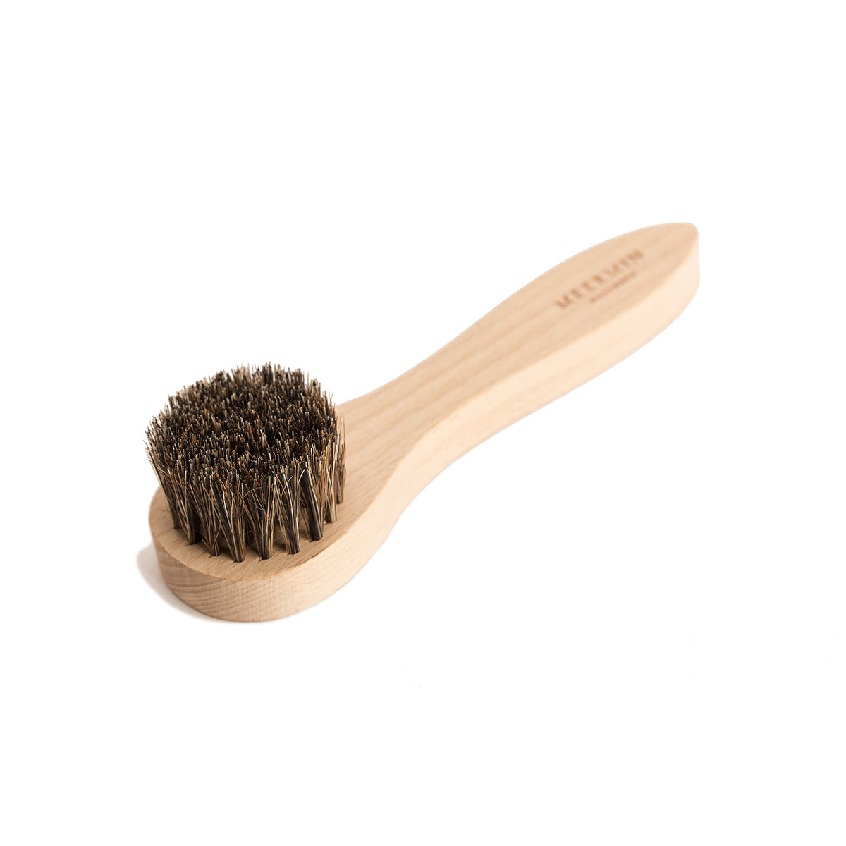 Meermin waxing brush, close-up angled view showing genuine horsehair bristles and beechwood handle with embossed logo
