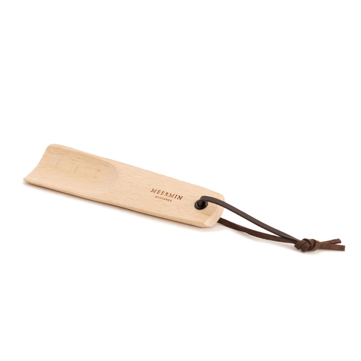 Meermin beechwood shoe horn with leather loop, diagonal view showing engraved logo and curved spoon end