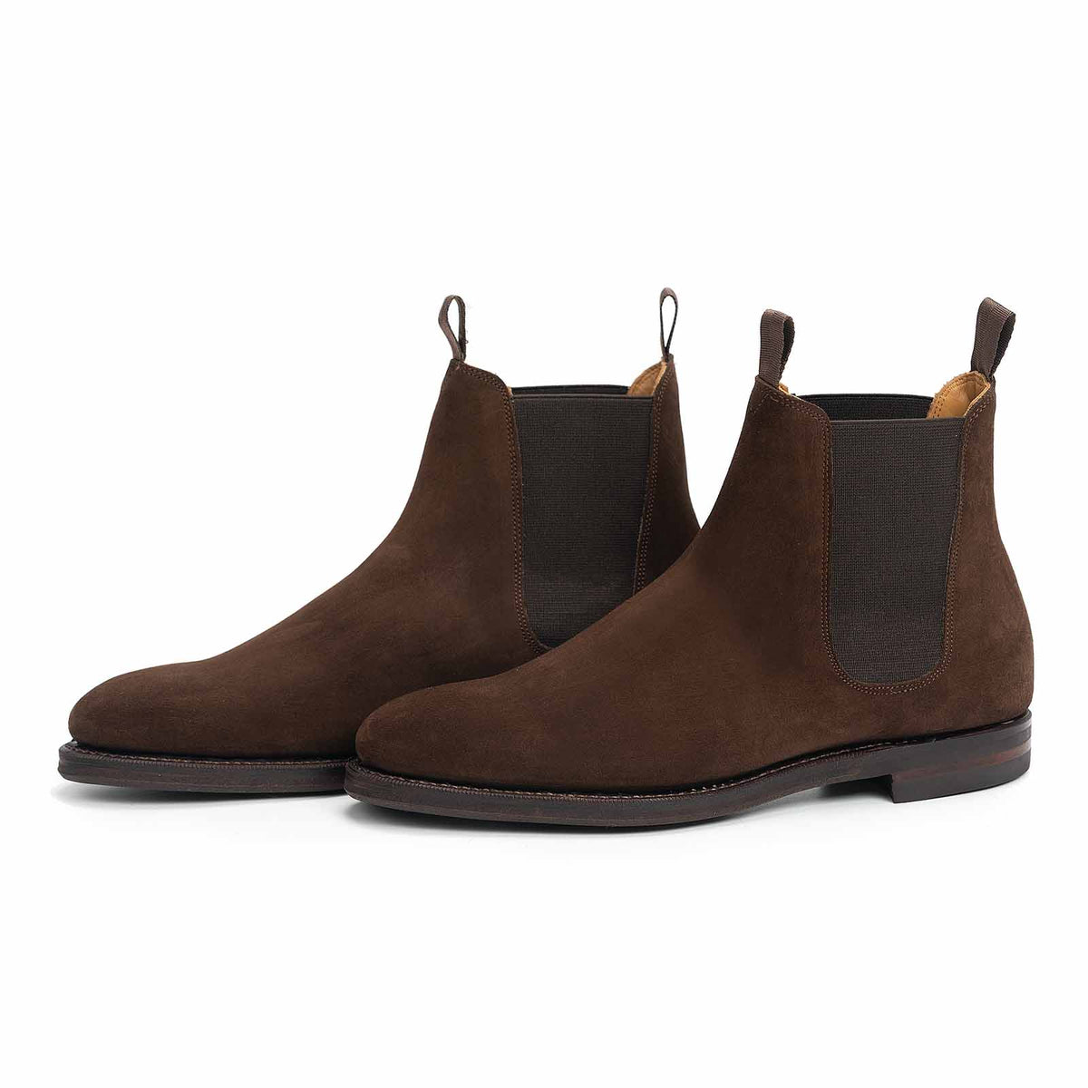 Meermin brown suede Chelsea boots, three-quarter front view of both pairs showing elastic side panels and pull tabs