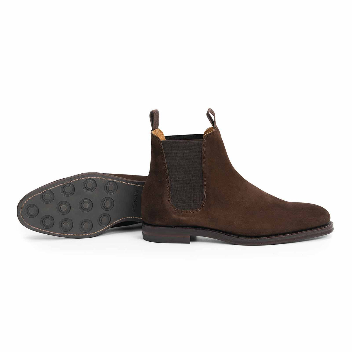 Meermin brown suede Chelsea boot, side profile paired with its sole facing up showing the studded rubber tread