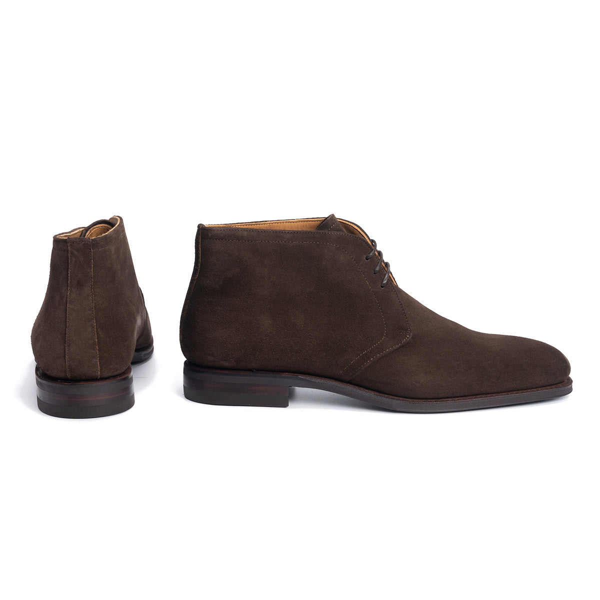 Meermin brown suede chukka boots, side profile and heel view showing Goodyear welted sole and stacked leather heel