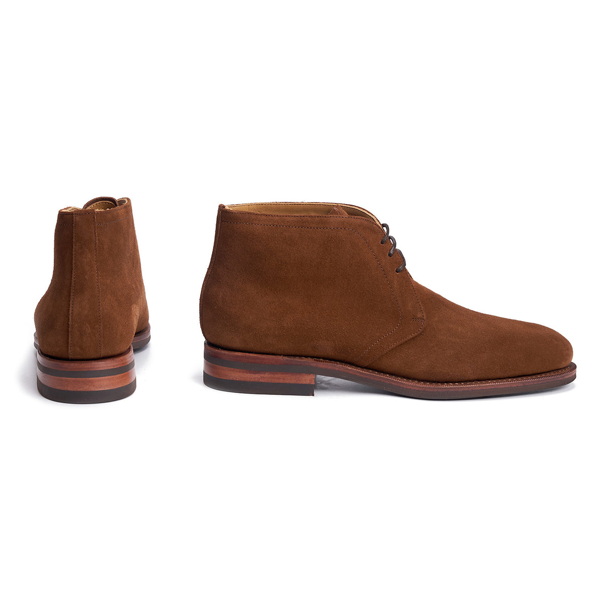 Meermin snuff suede chukka boots, side profile and rear view showing Goodyear welt and striped stacked leather heel