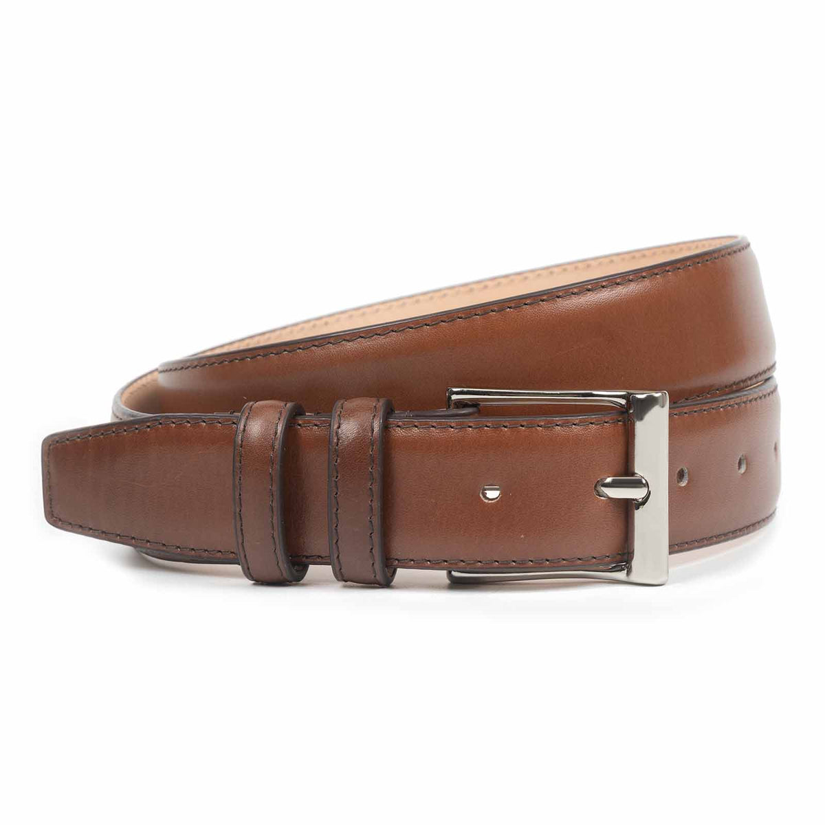 Meermin rust boxcalf belt, coiled to show nickel-plated buckle, double keeper loops, and stitched edge detail