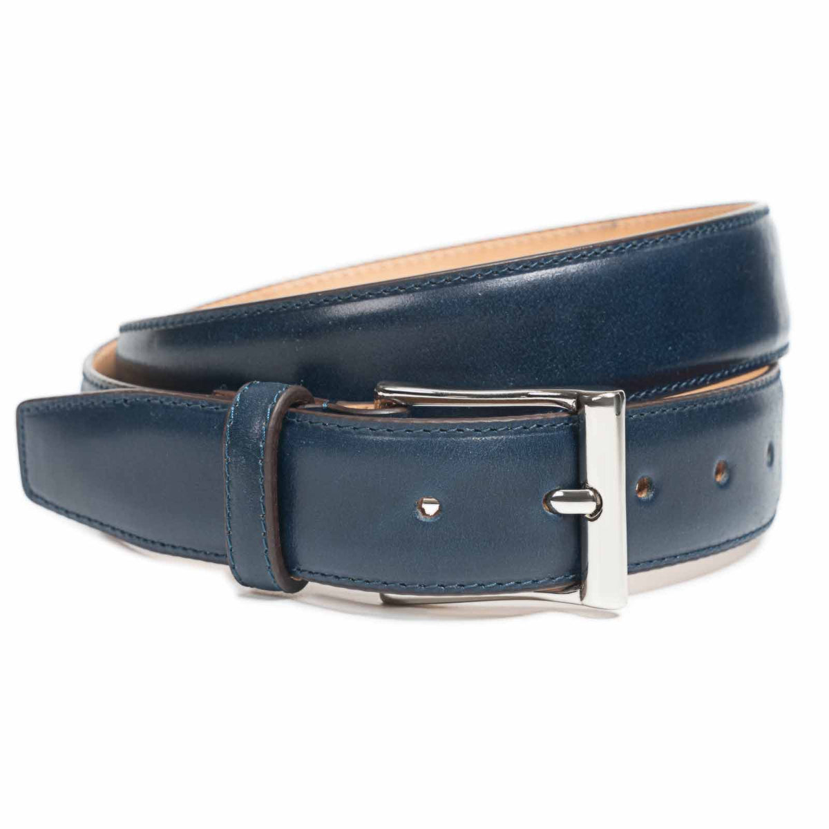 Meermin navy shell cordovan belt, coiled view showing nickel-plated buckle and tan leather lining
