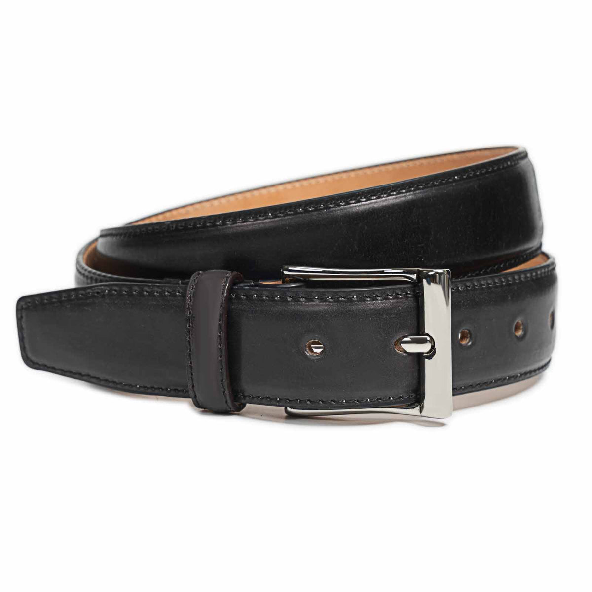 Meermin black shell cordovan belt, coiled to show nickel-plated brass buckle and stitched edge detail