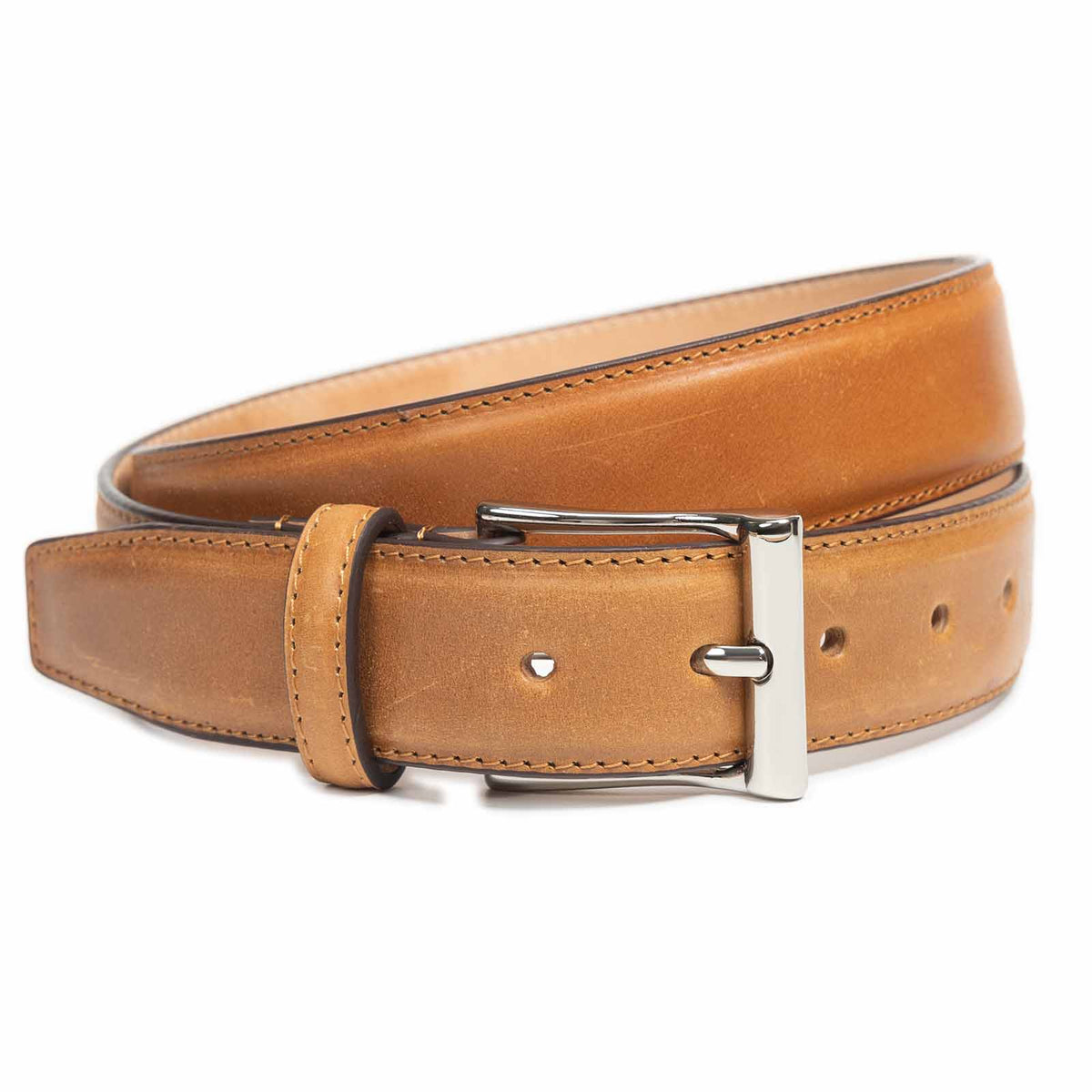 Meermin whiskey shell cordovan belt, coiled to show buckle detail with nickel-plated solid brass hardware and stitched keeper loop