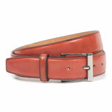 Meermin ruby shell cordovan belt, coiled to show buckle and full length, nickel-toned buckle detail visible