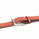 Meermin ruby shell cordovan belt, close-up on the stainless steel buckle and looped strap with visible stitching