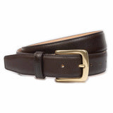 Meermin brown scotchgrain leather belt, coiled to show solid brass buckle and pebbled grain texture, side angle view