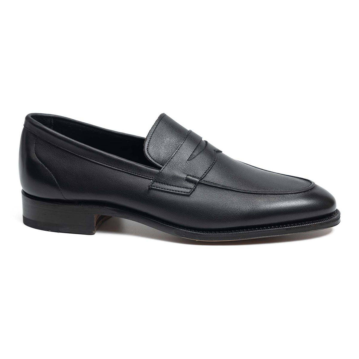 Meermin black softcalf penny loafer, side profile view showing unlined upper and closed channel leather sole