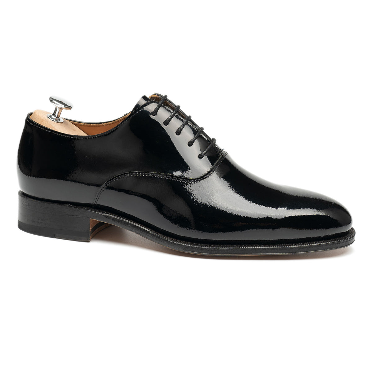 Meermin black patent leather Oxford, side profile on a shoe tree, plain toe Balmoral with flex Goodyear welted sole