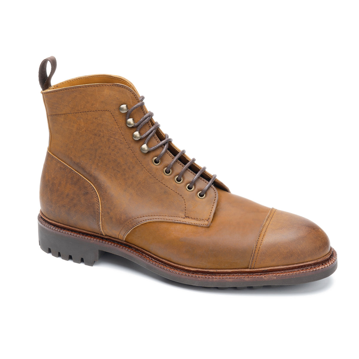 Meermin tobacco waxy shell cordovan cap-toe boot, three-quarter side profile showing lace hooks, eyelets, and lugged sole