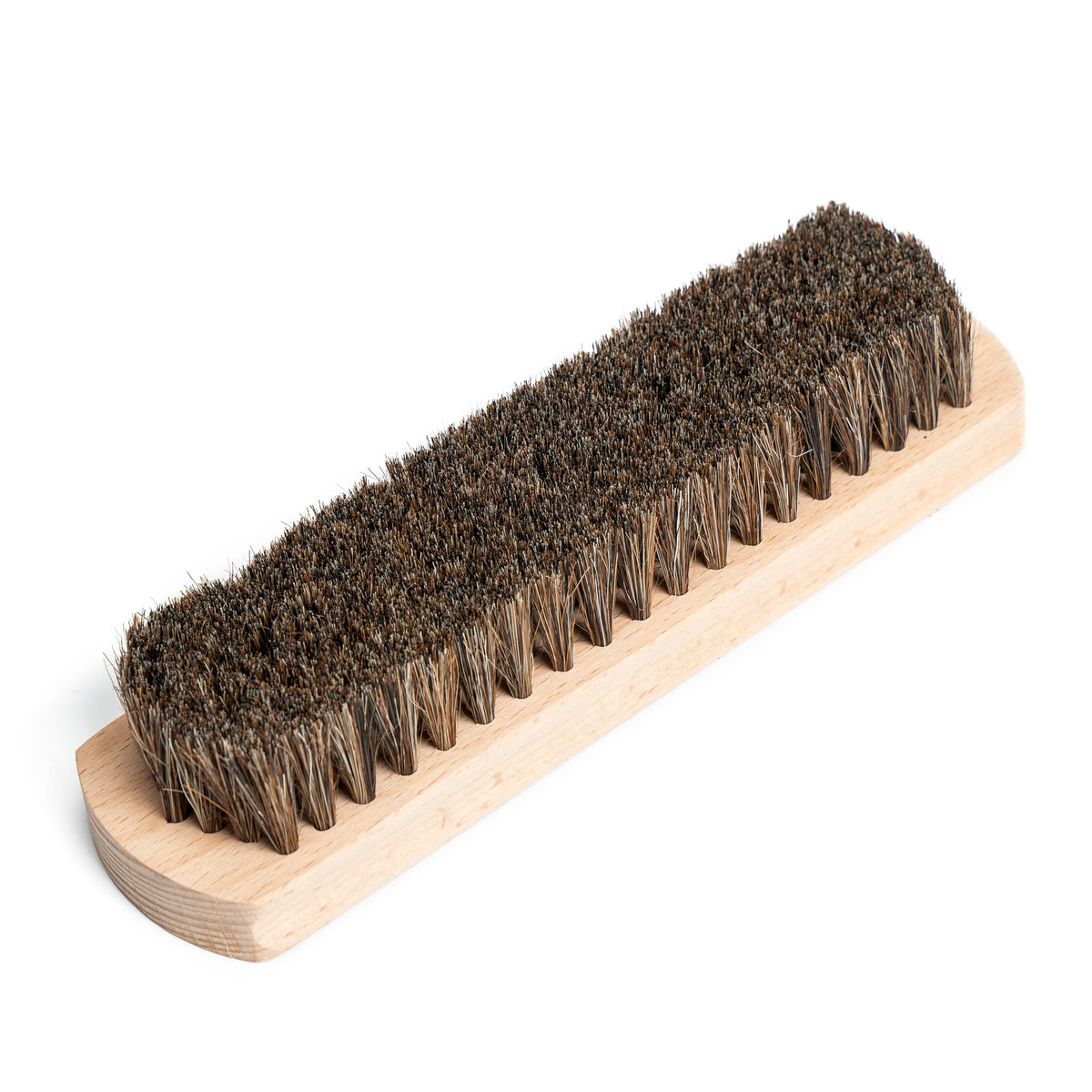 Meermin large shoe brush, close-up diagonal view showing dense genuine horsehair bristles on beechwood block