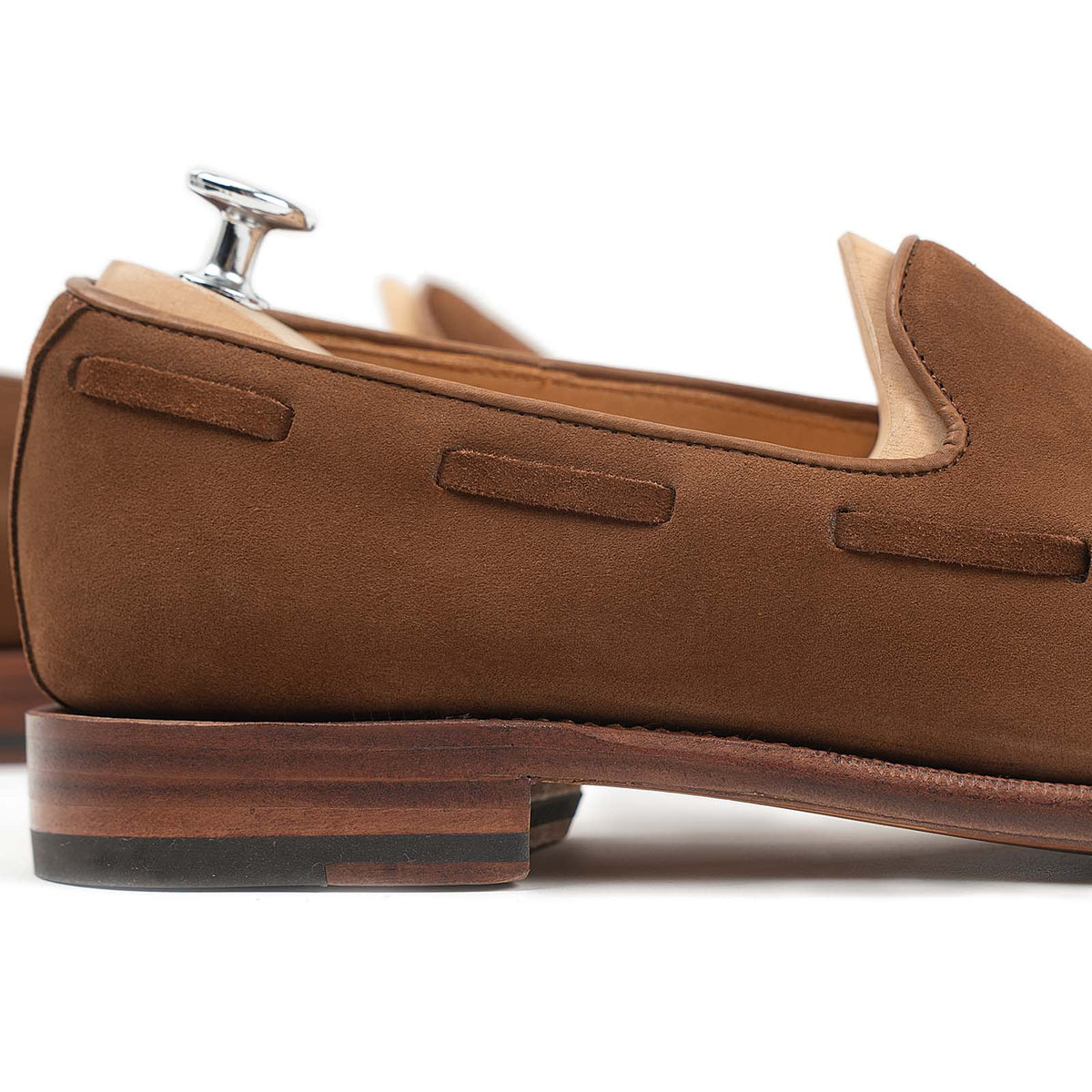 Meermin snuff Superbuck suede loafer, close-up heel and stacked leather sole detail with shoe tree inserted