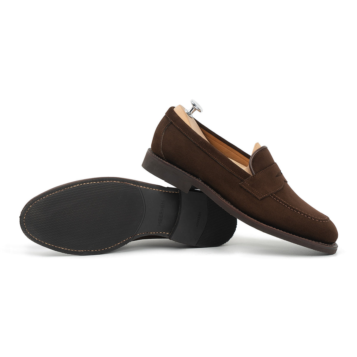 Meermin brown suede penny loafers shown paired with soles facing up, displaying diamond latex rubber sole tread detail