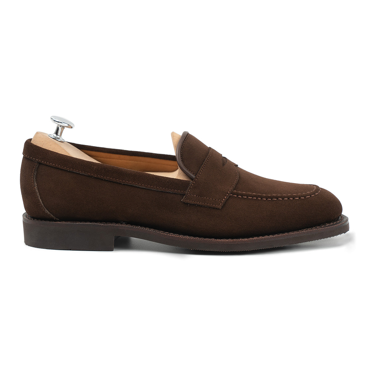 Meermin brown suede penny loafer, side profile on shoe tree showing diamond latex rubber sole and flex Goodyear welt