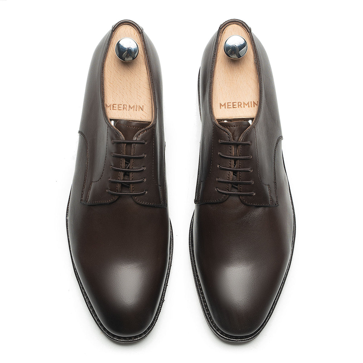 Meermin brown silkcalf plain-toe bluchers, top-down view of both shoes on shoe trees showing lacing detail