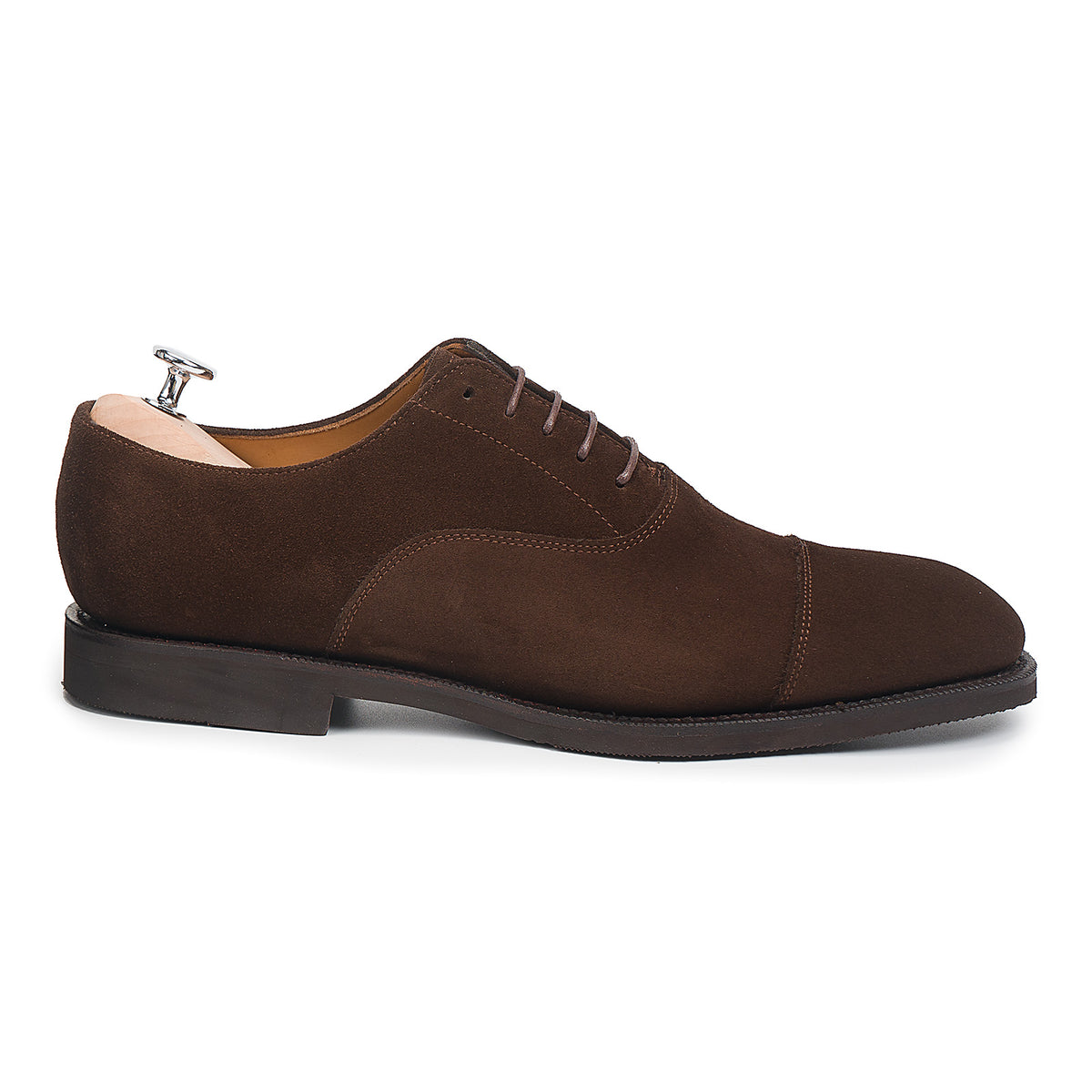 Meermin brown suede cap-toe Oxford, side profile with shoe tree inserted, showing lacing detail and diamond rubber sole