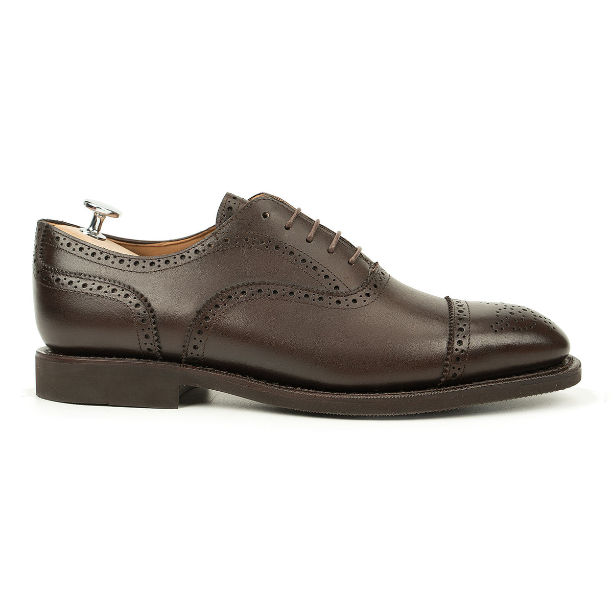 Meermin brown boxcalf full brogue Oxford, side profile with shoe tree inserted, showing broguing detail and diamond latex rubber sole