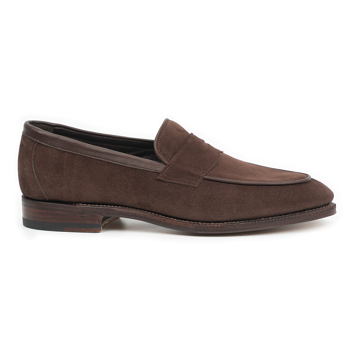Meermin brown suede penny loafer, side profile showing piping apron and flex leather sole on the Nova last
