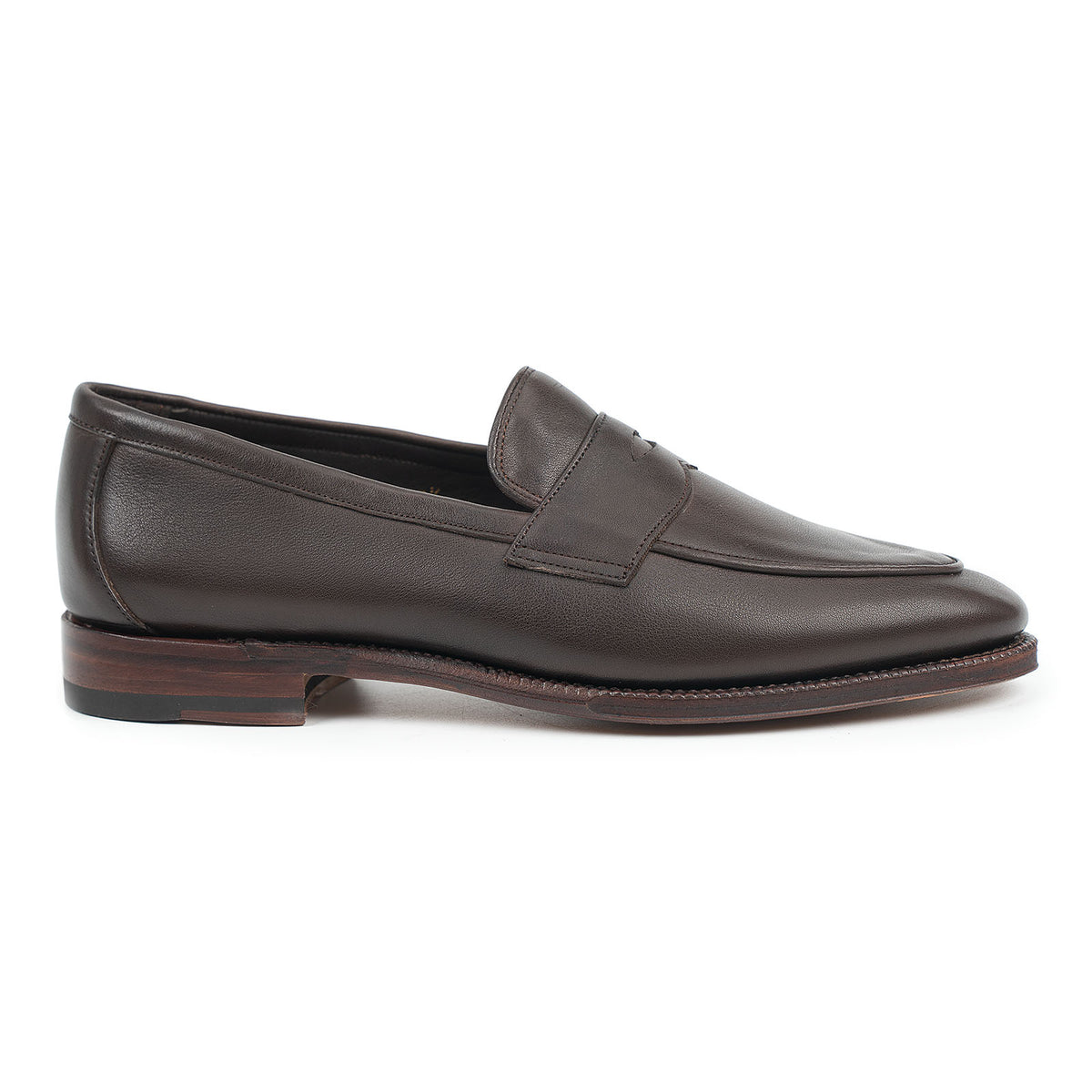 Meermin brown softcalf penny loafer, side profile showing the piping apron and leather sole