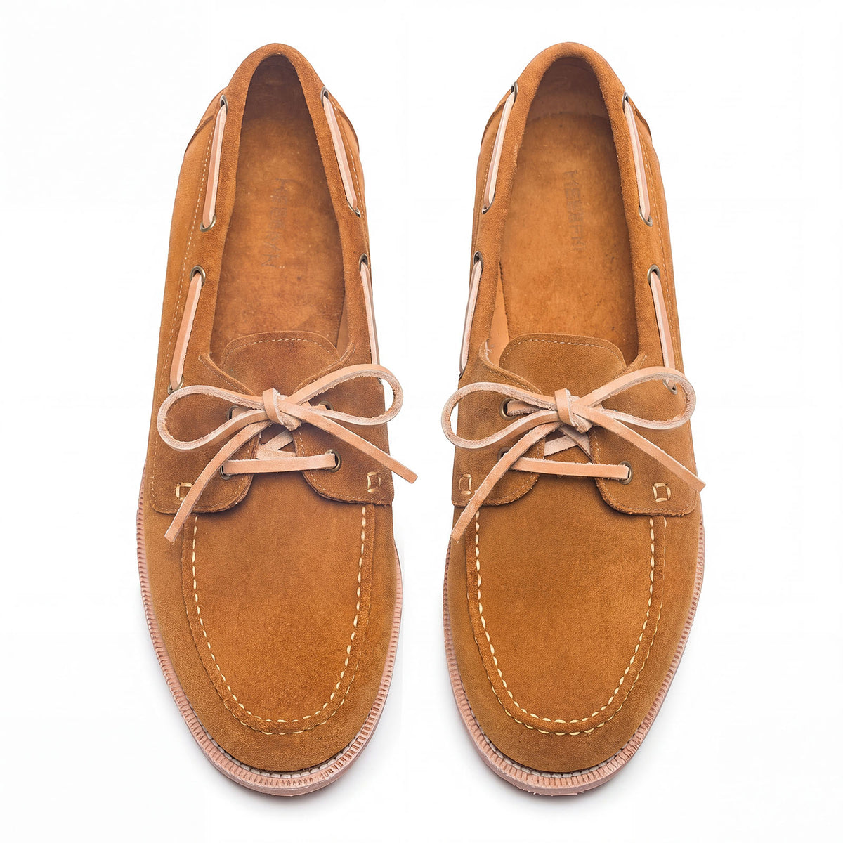 Meermin tobacco suede welted deck shoes, overhead top-down view of both, showing vegetable-tanned leather laces and moc-toe stitching