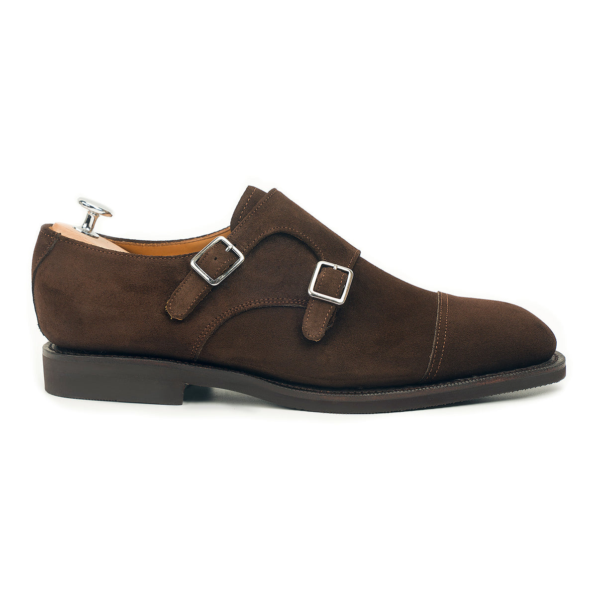 Meermin brown suede double monkstrap, side profile on shoe tree, showing stainless-steel buckles and diamond rubber sole