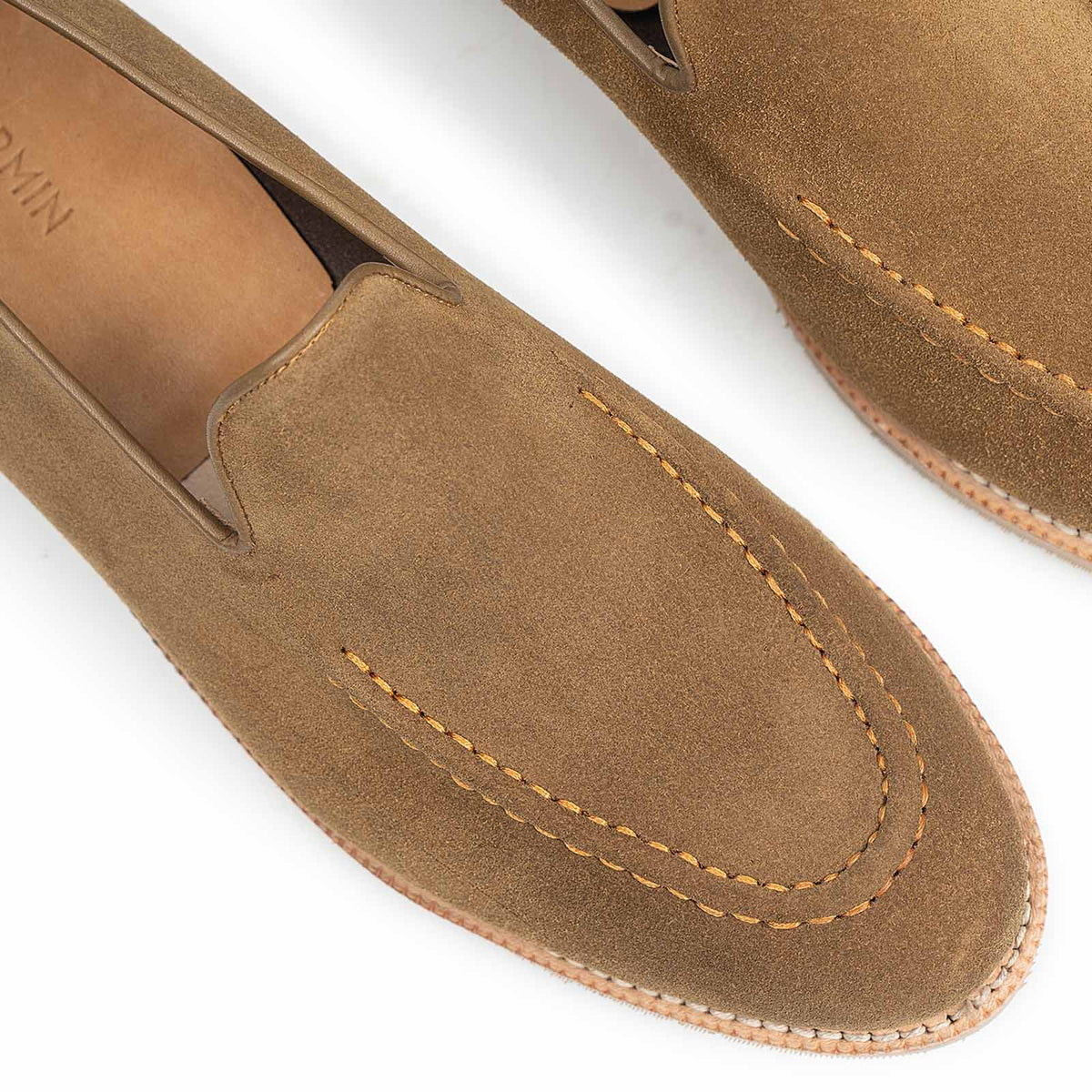 Meermin Atacama suede unlined loafers, close-up on toe apron stitching and vamp, showing hand-sewn detail and tonal suede texture