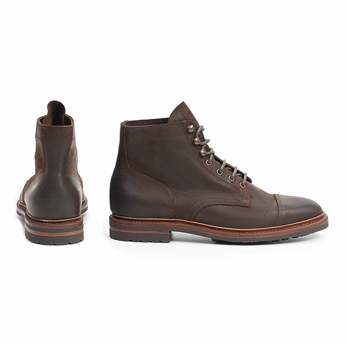 Meermin waxy commander cap-toe boots in rust, side profile and heel view showing lace-up front and stacked leather sole