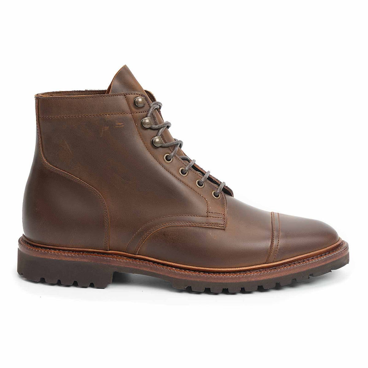 Meermin tobacco waxy calf cap-toe boot, side profile showing lug rubber sole and cap-toe stitching detail