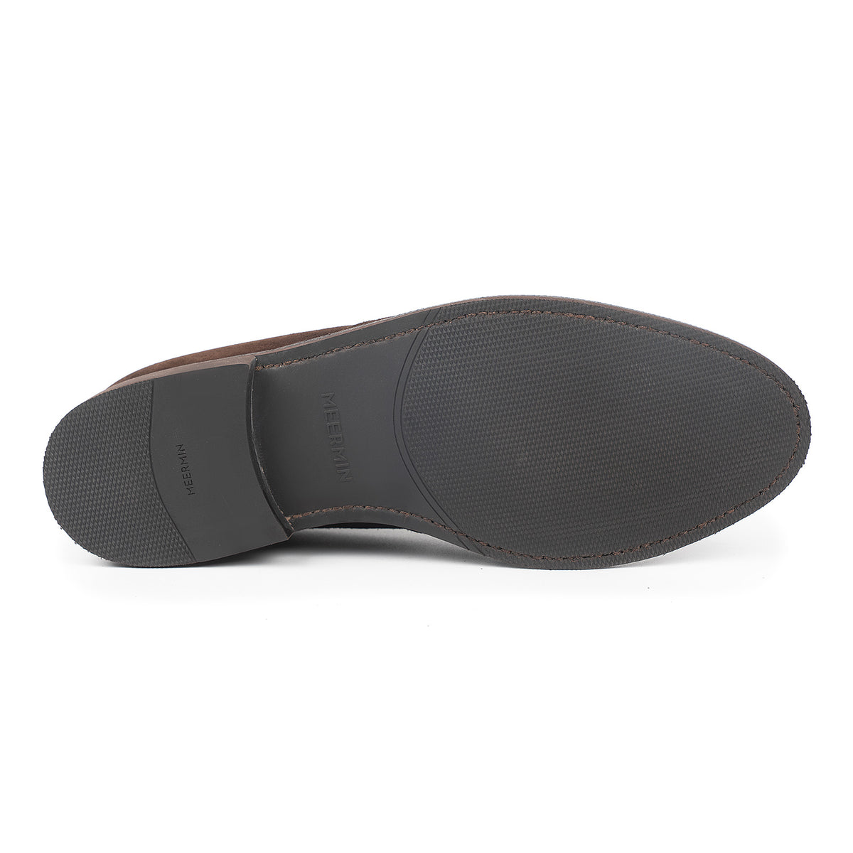 Sole view of Meermin brown suede chukka boot, showing diamond latex rubber outsole with textured tread and Goodyear welt stitching