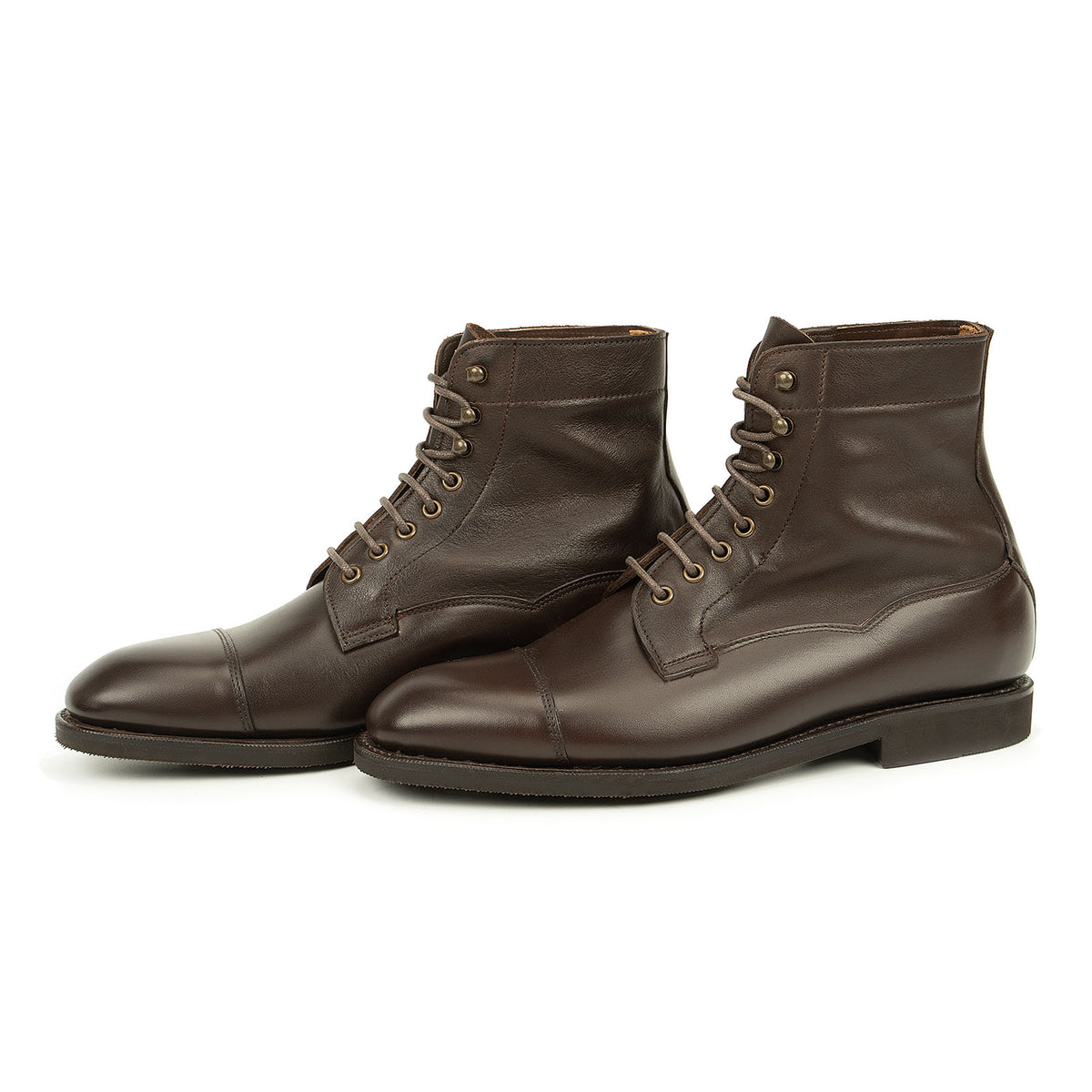 Meermin brown boxcalf cap-toe lace-up boots, three-quarter front view showing softcalf shafts and diamond latex rubber soles