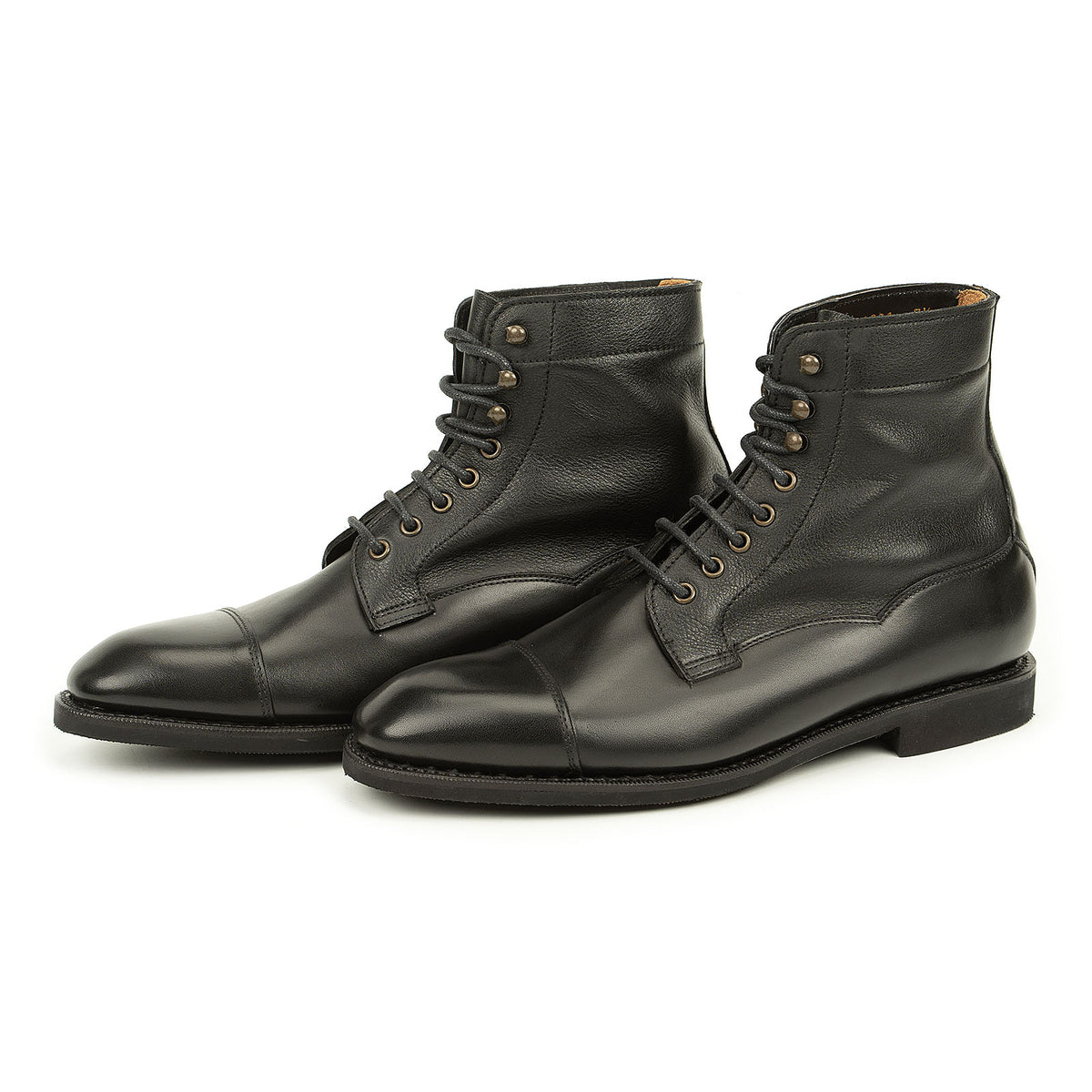 Meermin black boxcalf cap-toe lace-up boots, pair shown at three-quarter angle with softcalf shafts and lace hooks visible