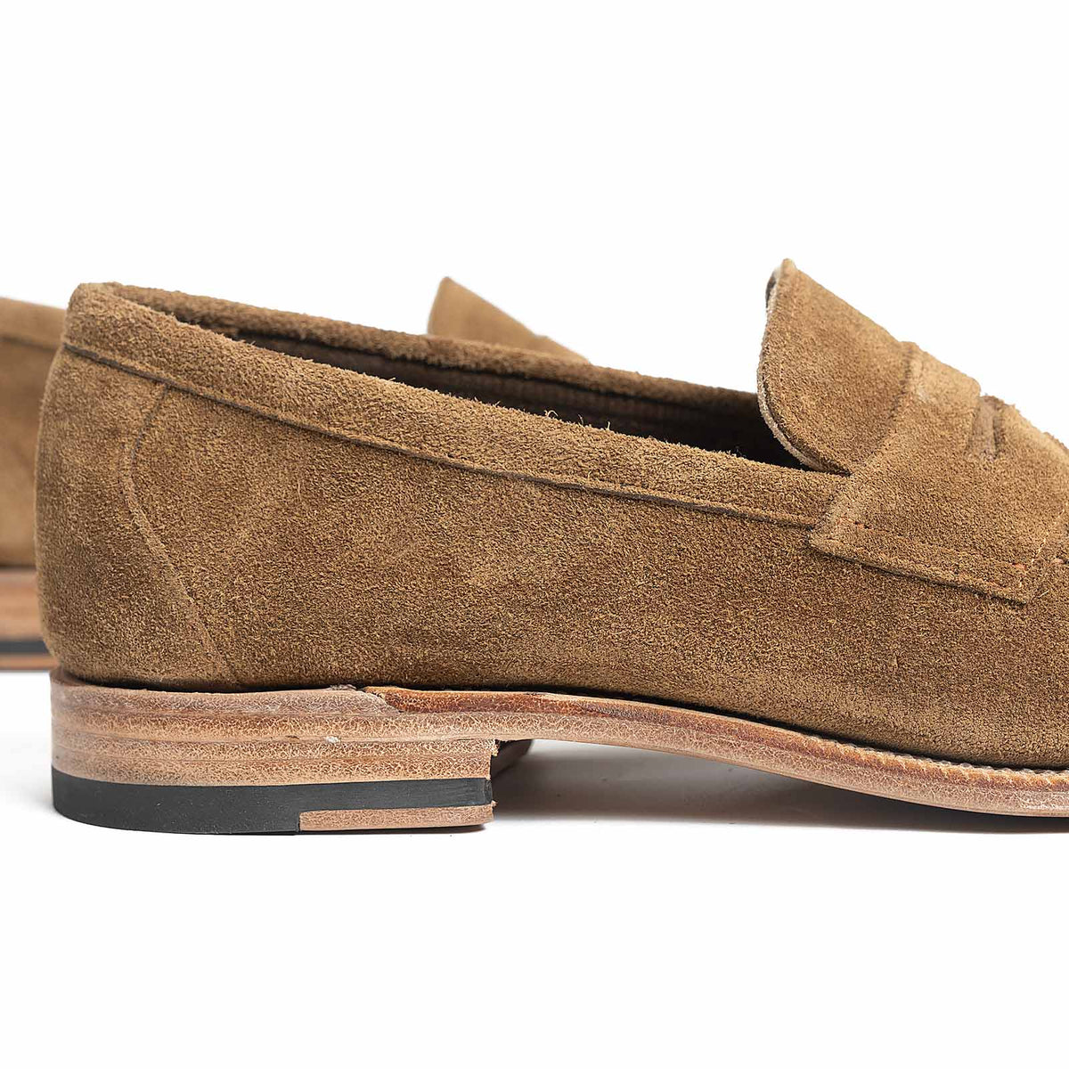 Meermin Atacama suede unlined loafer, close-up side profile showing heel counter and flex Goodyear welted leather sole