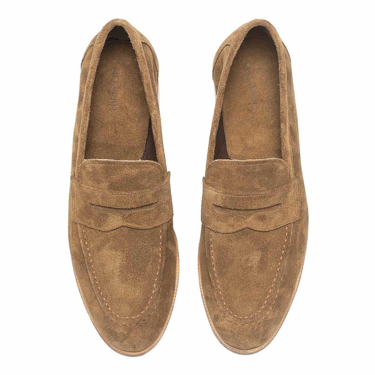 Meermin Atacama suede penny loafers, top-down view of both shoes showing round toe shape and saddle strap detail
