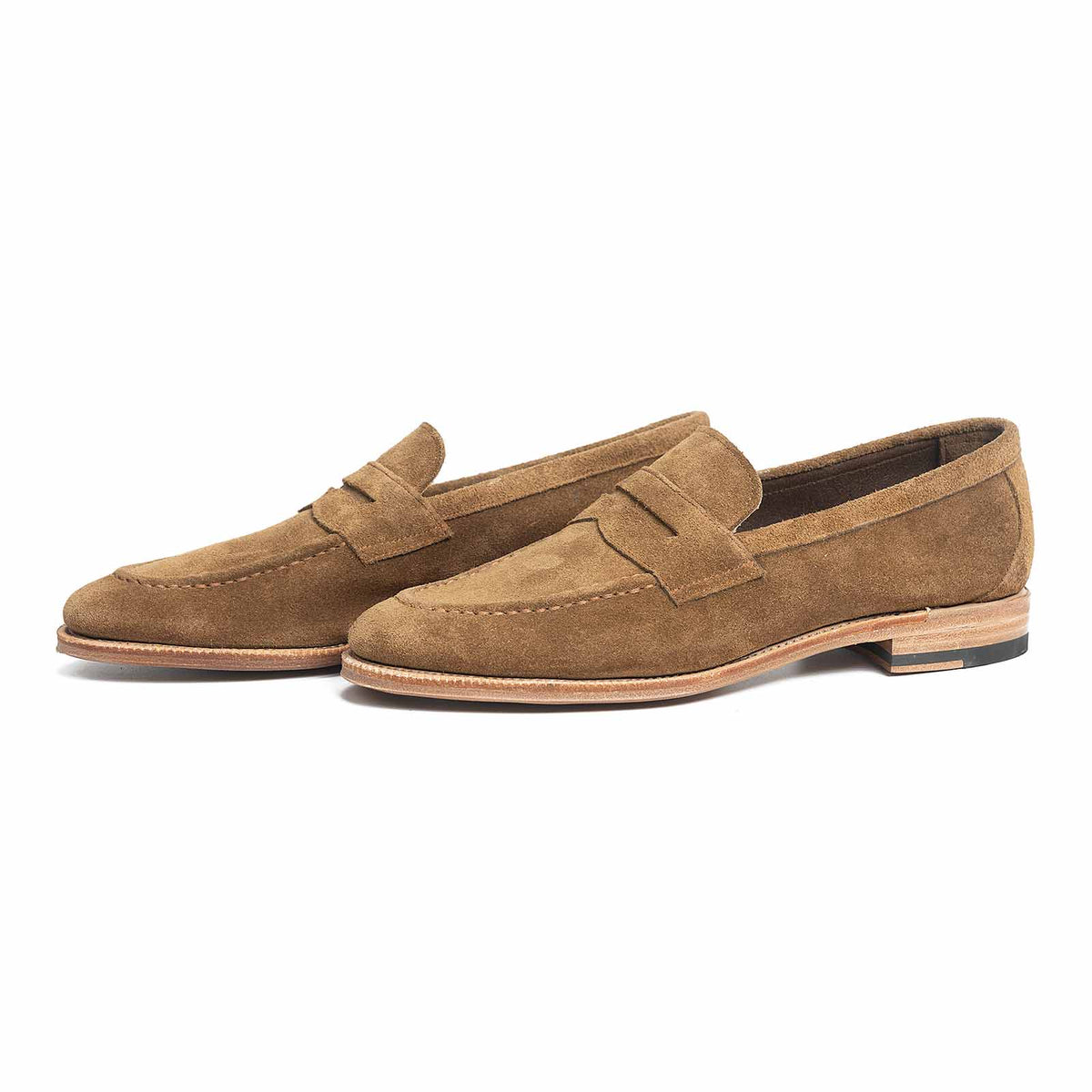 Meermin Atacama suede penny loafers, pair shown side by side in three-quarter profile on white background
