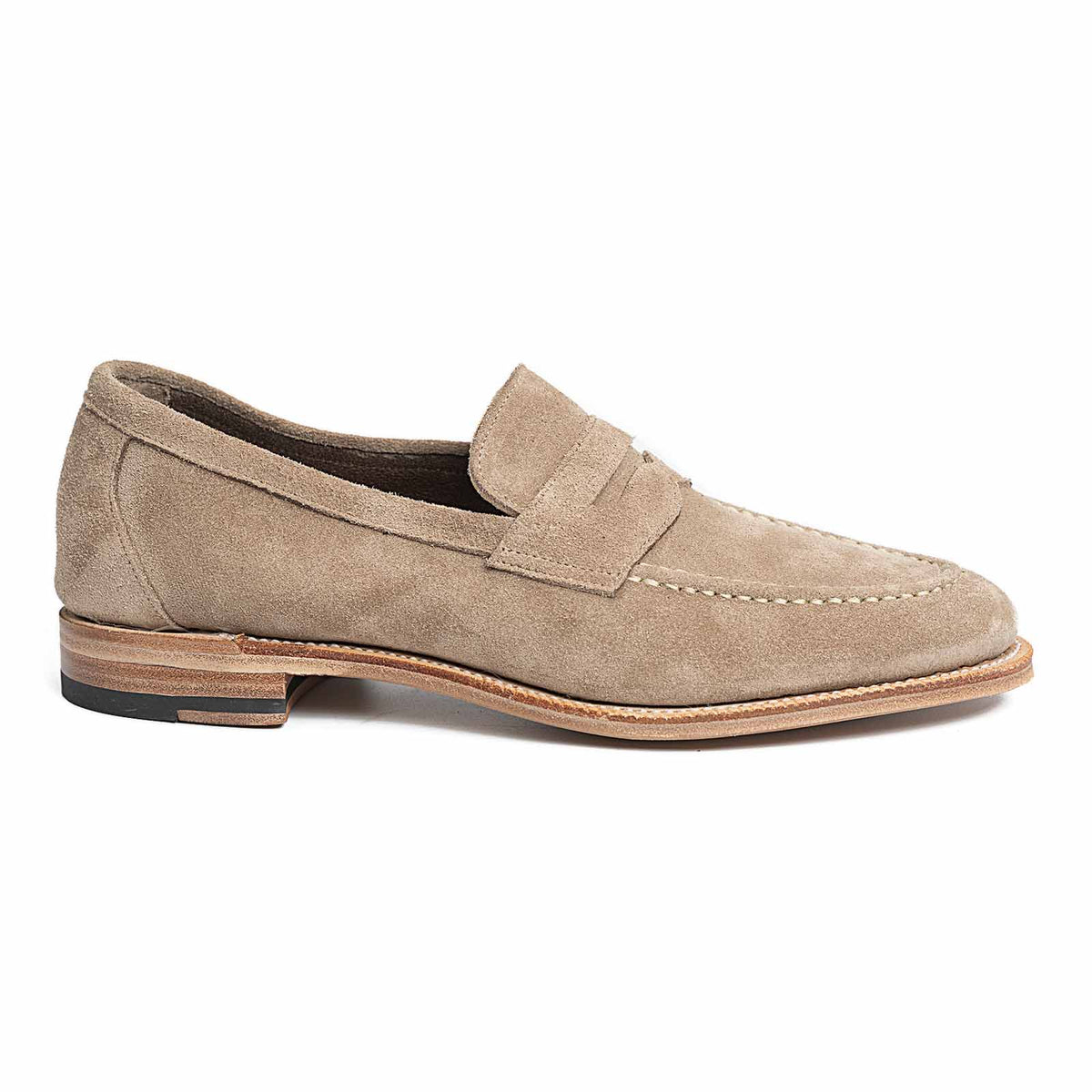 Meermin taupe suede penny loafer, side profile showing flex Goodyear welt and closed-channel leather sole