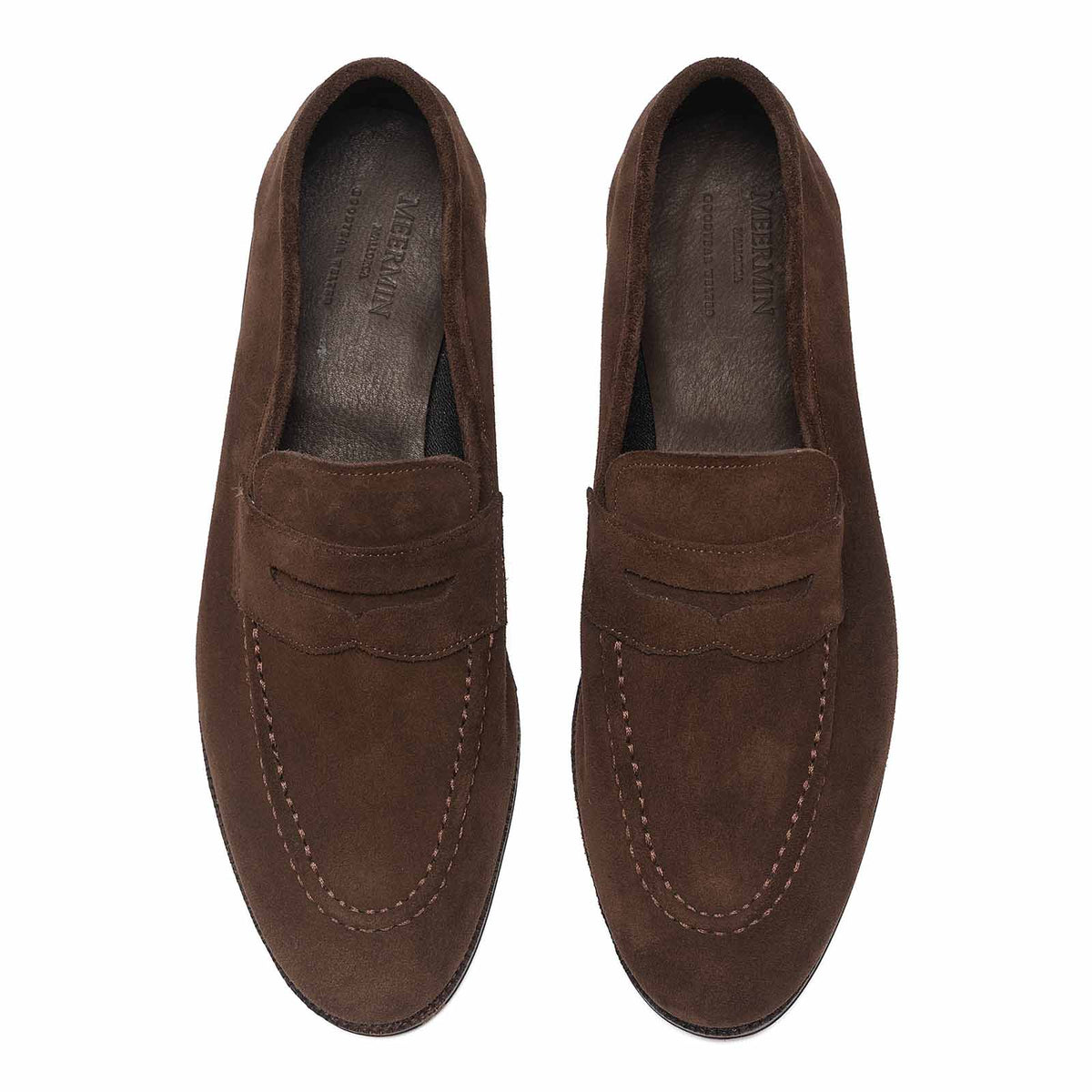 Meermin brown Superbuck suede penny loafers, top-down view of both shoes showing apron stitching and unlined interior