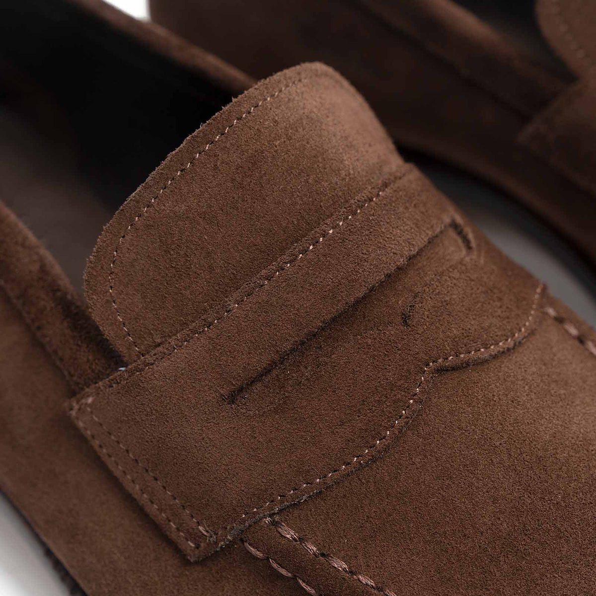 Meermin brown Superbuck suede loafer, close-up of the penny strap and stitching detail on the vamp