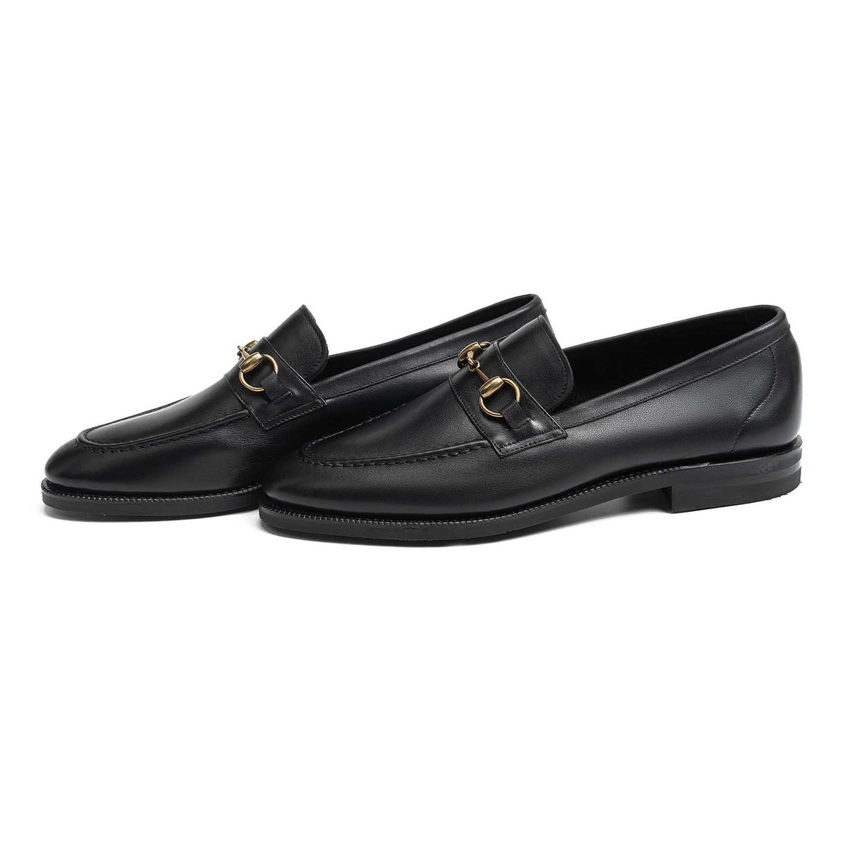 Meermin black softcalf horsebit loafers, three-quarter side view showing gold hardware and city rubber sole